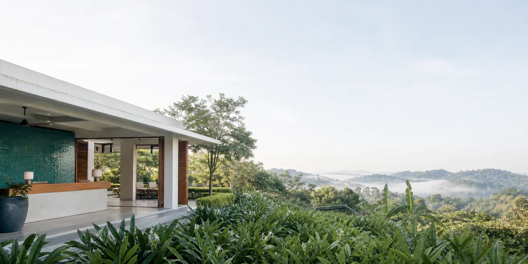 A Sri Lankan hospitality property overlooking a tropical landscape